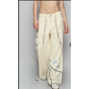 1️⃣ medium left. 🔥 Denim Patchwork Cream Flare Jeans.